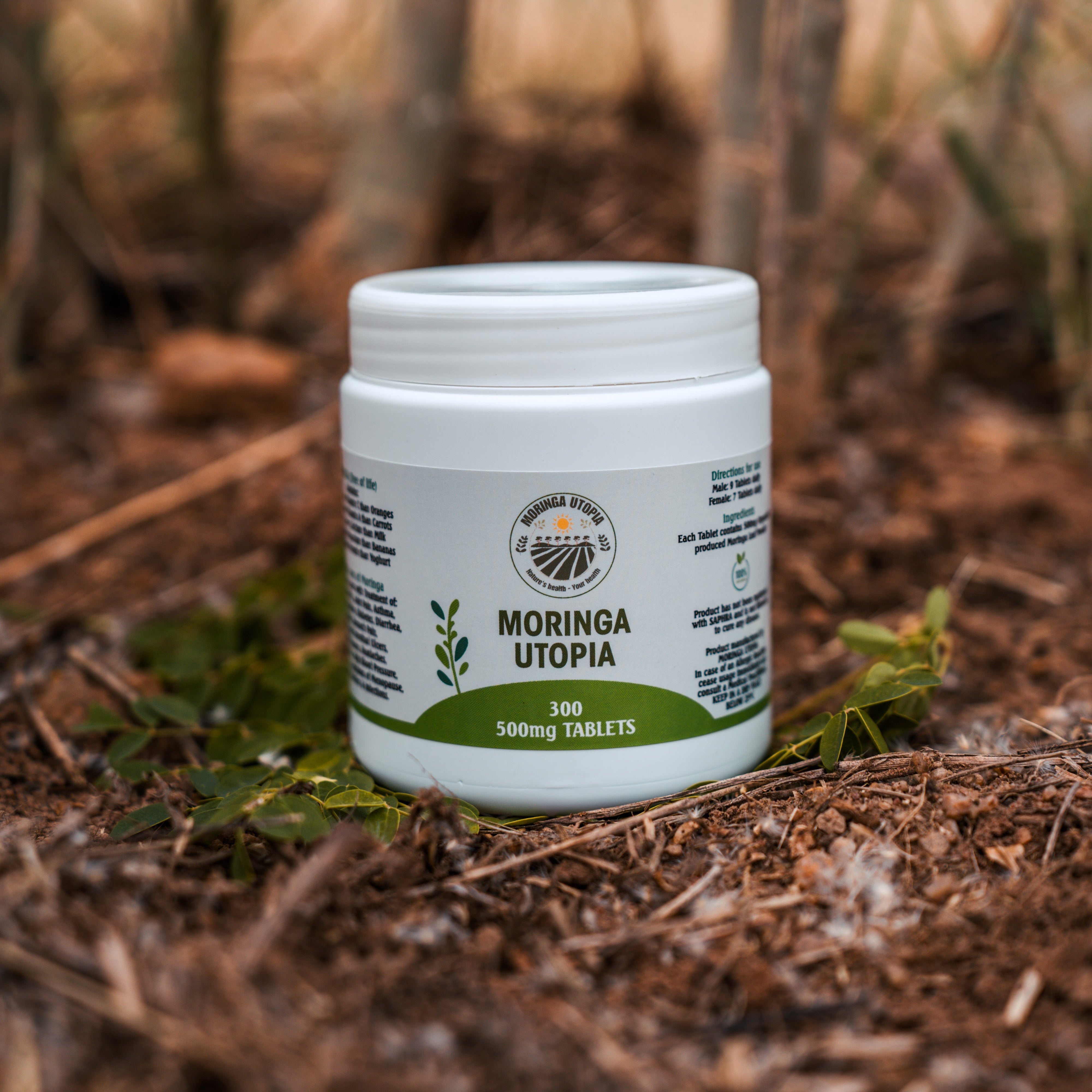 Jar of Moringa Utopia tablets on a natural background