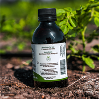 Back of Moringa Utopia 200ml dark moringa oil bottle